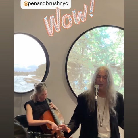 Patti Smith performing at the No Matter What exhibit opening with Rebecca Foon and her daughter Jess Paris Smith.