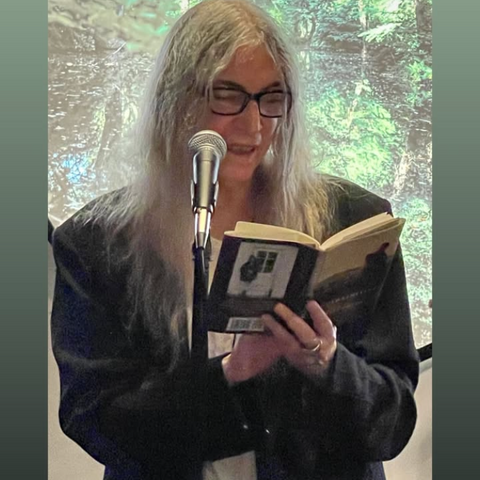 Patti Smith performing at the No Matter What exhibit opening