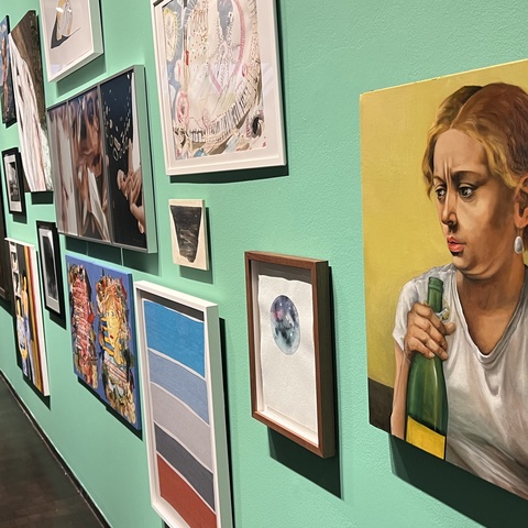 Golden Age by Dana Ellyn with the Pen + Brush gallery wall full of painitngs