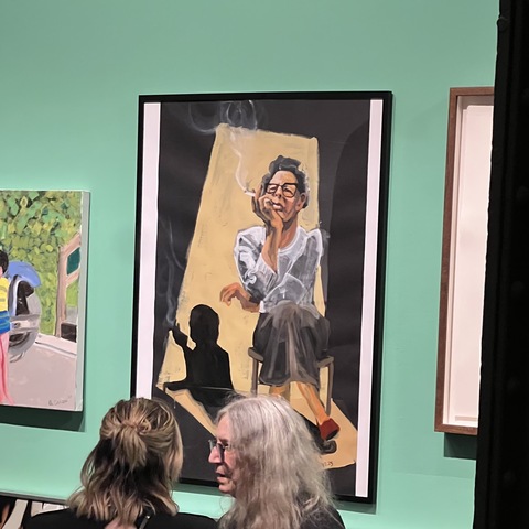 Patt Smith with Dana Ellyn's painting of Hannah Arendt, "Banality"